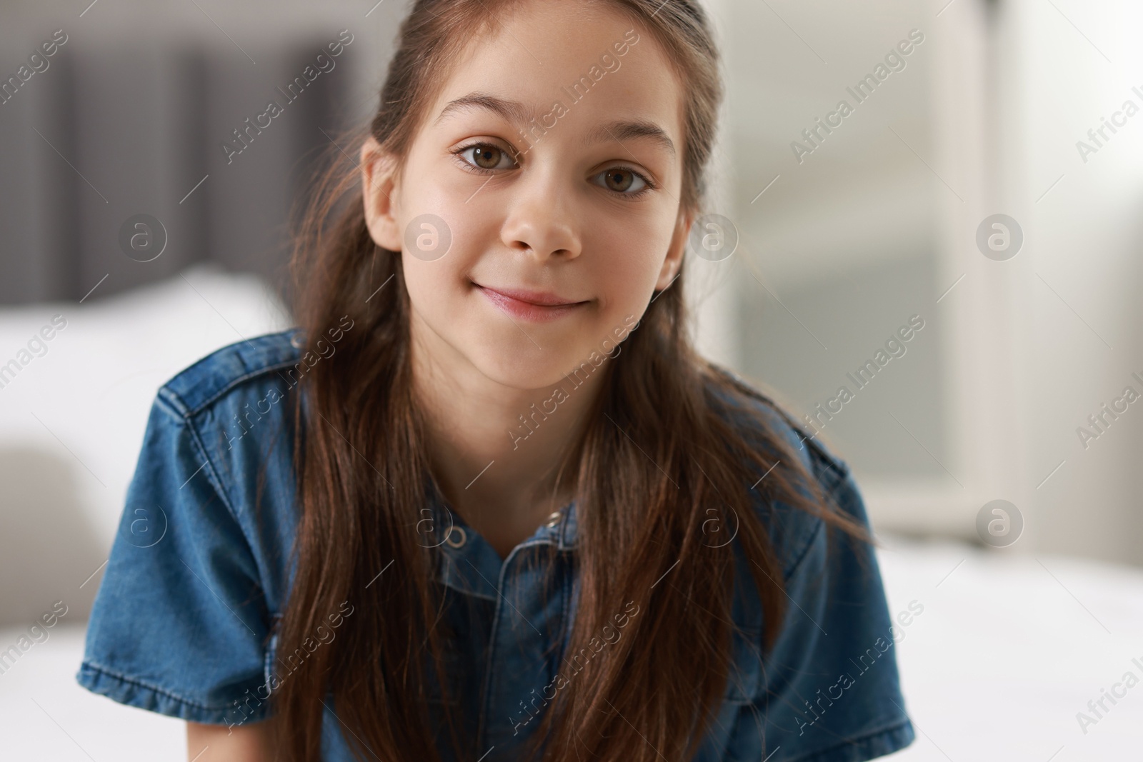 Photo of Portrait of beautiful little girl indoors. Cute child