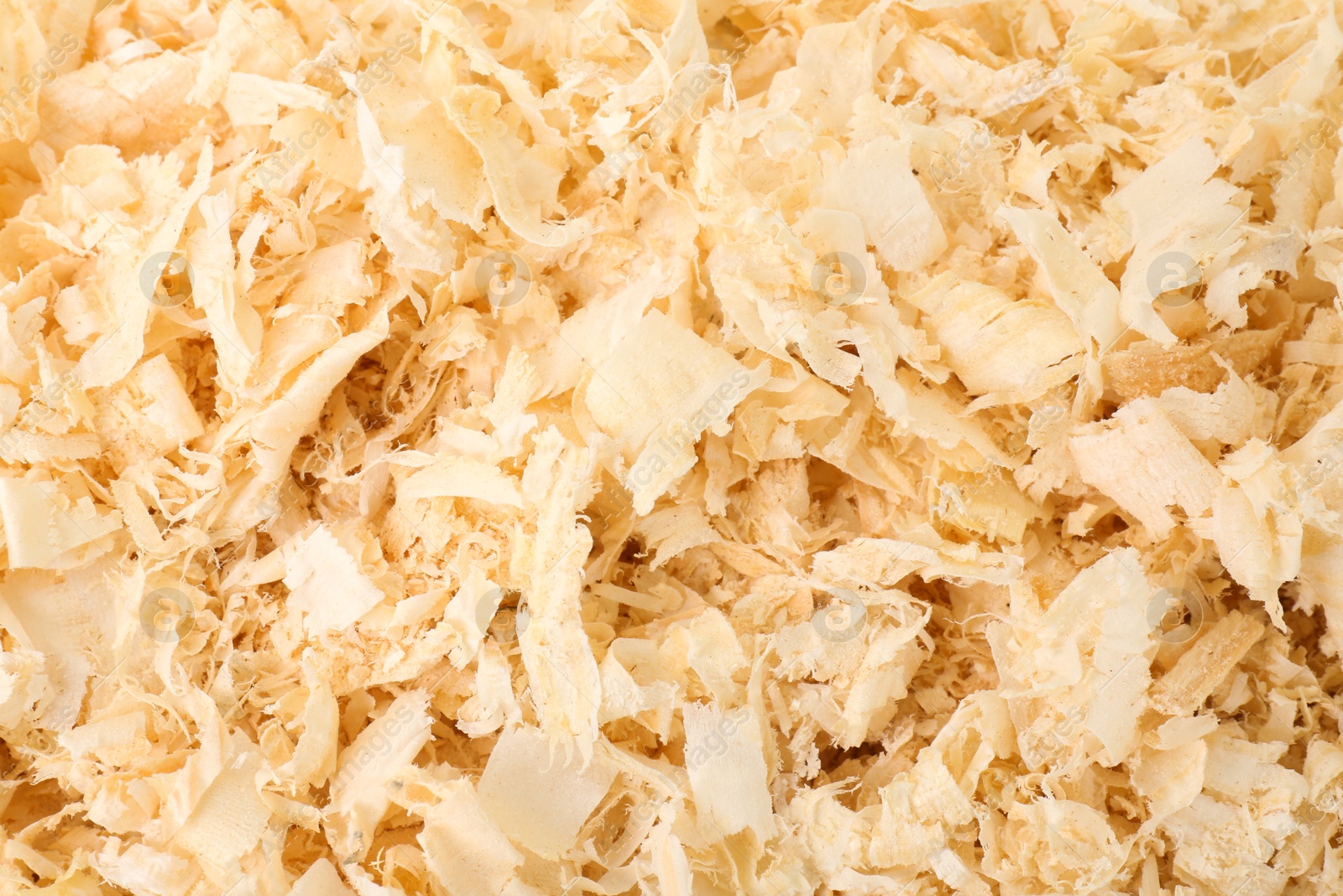 Photo of Pile of natural sawdust as background, closeup