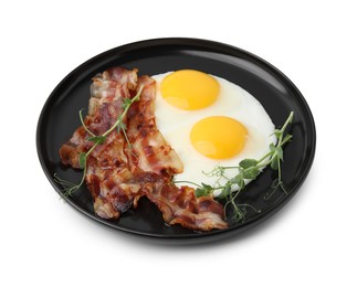 Photo of Fried eggs, bacon and microgreens isolated on white