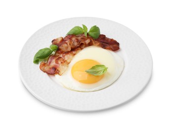 Photo of Fried egg, bacon and basil isolated on white