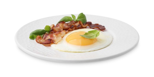 Fried egg, bacon and basil isolated on white