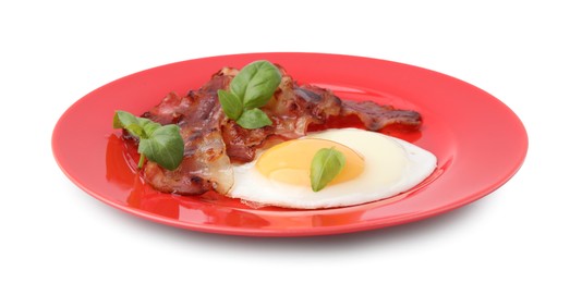 Fried egg, bacon and basil isolated on white