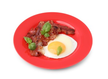 Fried egg, bacon and basil isolated on white