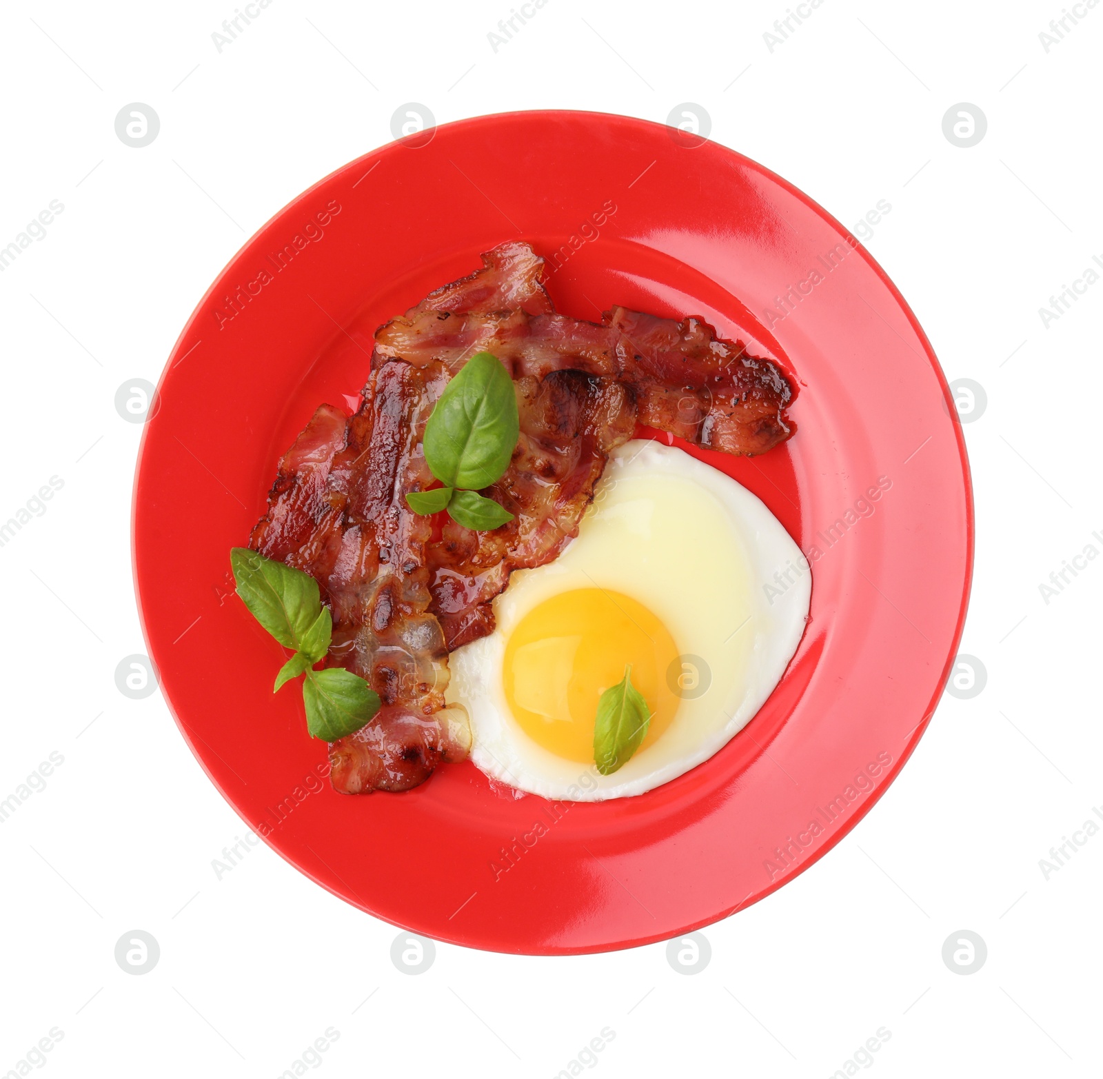 Photo of Fried egg, bacon and basil isolated on white, top view
