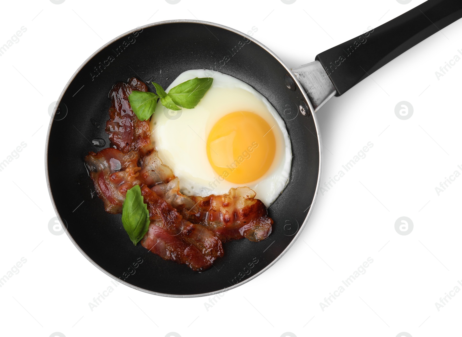 Photo of Fried egg, bacon and basil in frying pan on white background, top view