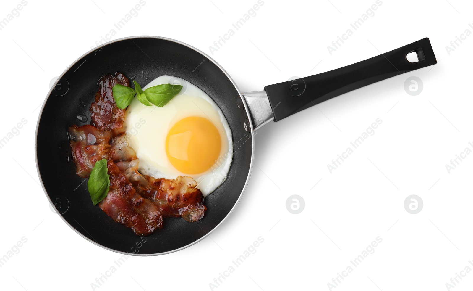 Photo of Fried egg, bacon and basil in frying pan on white background, top view