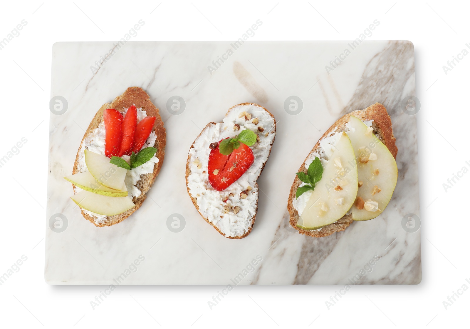 Photo of Delicious bruschettas with fresh ricotta (cream cheese), strawberry, mint and pear isolated on white, top view