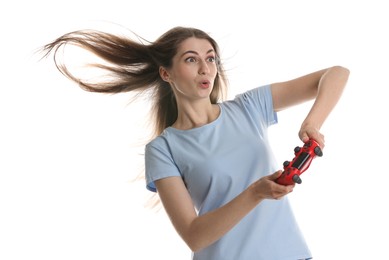 Photo of Excited woman playing video games with controller on white background