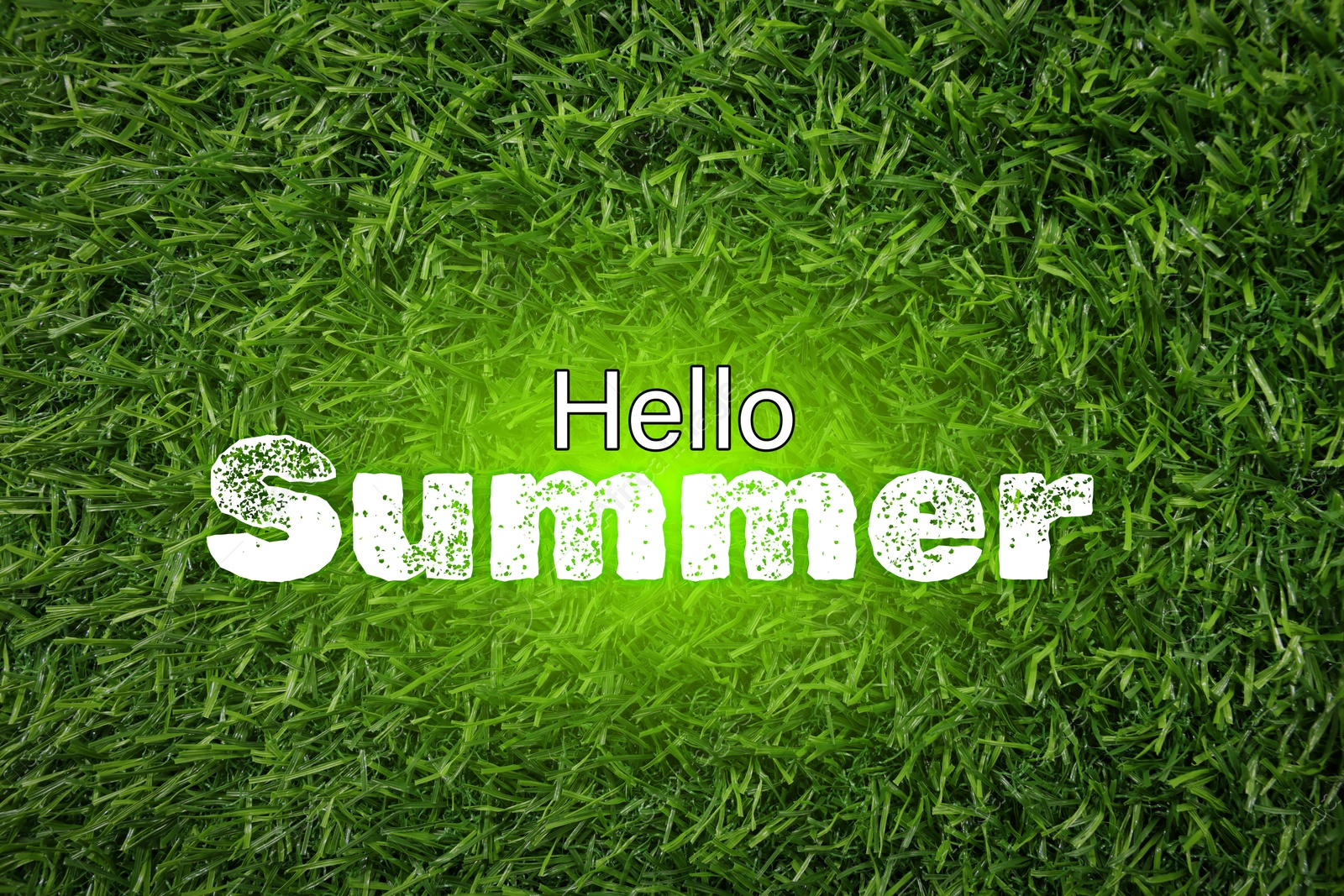 Image of Hello Summer text and vibrant green grass on background, top view