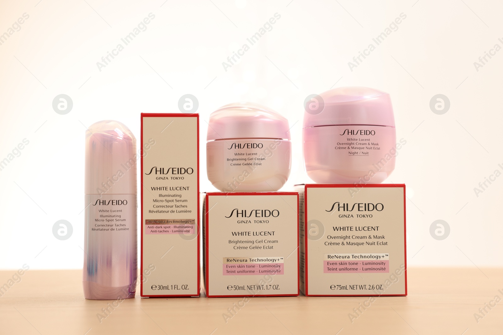 Photo of Leiden, Netherlands - June 11, 2024: Shiseido care cosmetic products on wooden table against light background