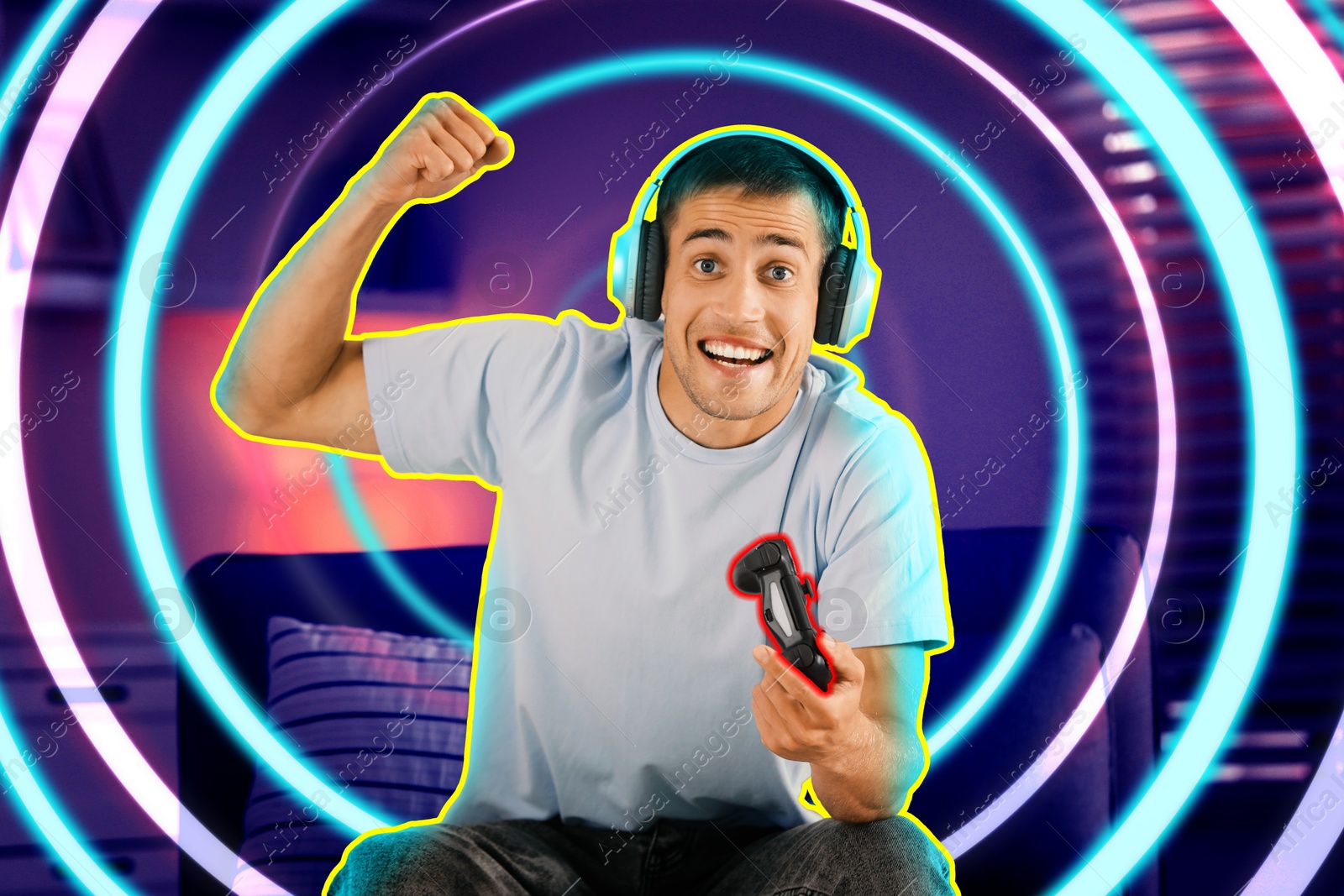 Image of Happy man playing video game with controller indoors. Colorful spiral around him