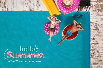 Image of Hello Summer. Happy couple with inflatable rings in swimming pool, top view