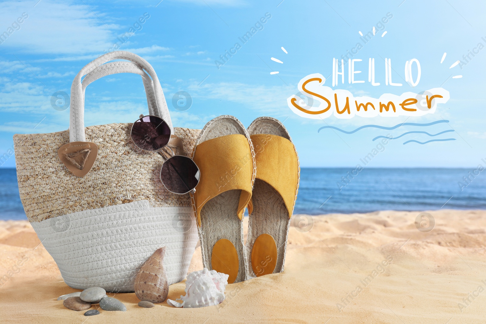 Image of Hello Summer. Beach bag with different stuff on sea coast