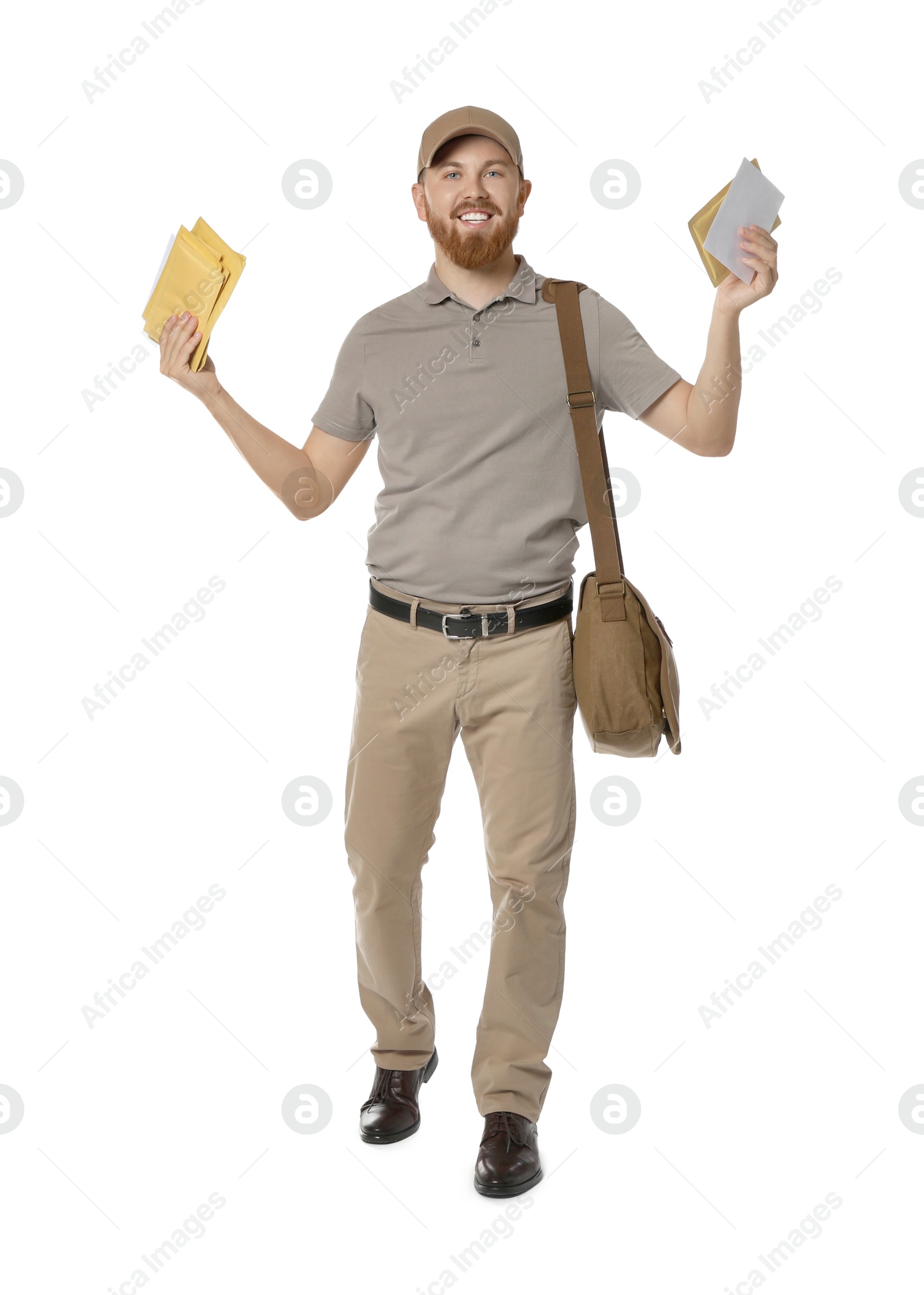 Photo of Happy young postman with brown bag delivering letters on white background