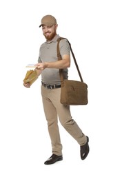 Photo of Happy young postman with brown bag delivering letters on white background