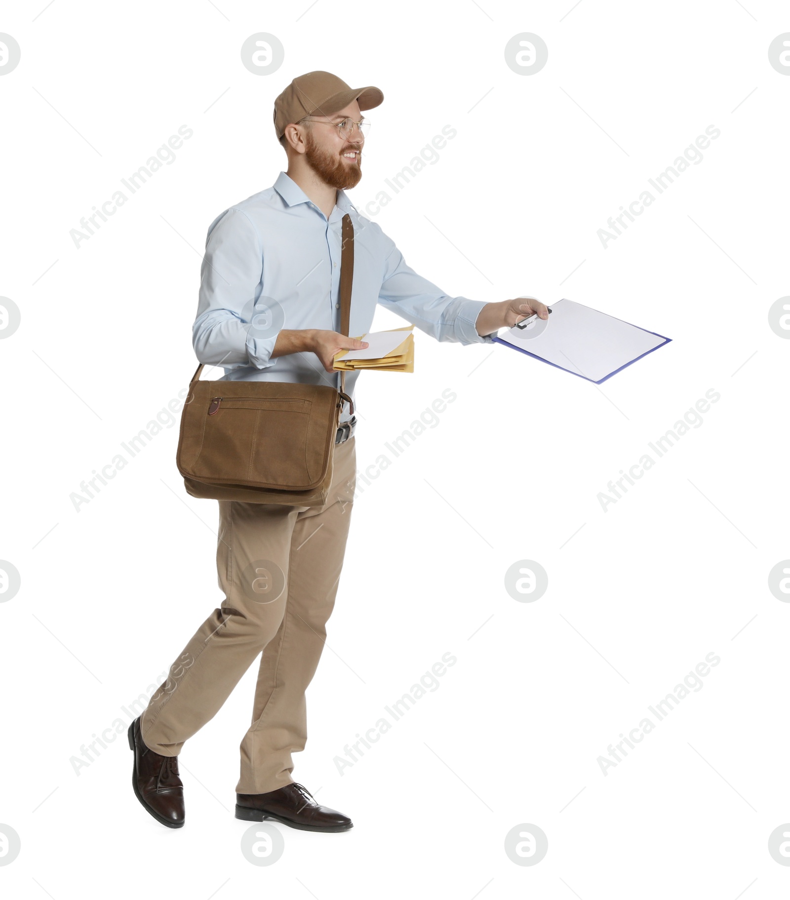Photo of Happy young postman with brown bag delivering letters on white background
