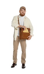 Happy young postman with brown bag delivering letters on white background