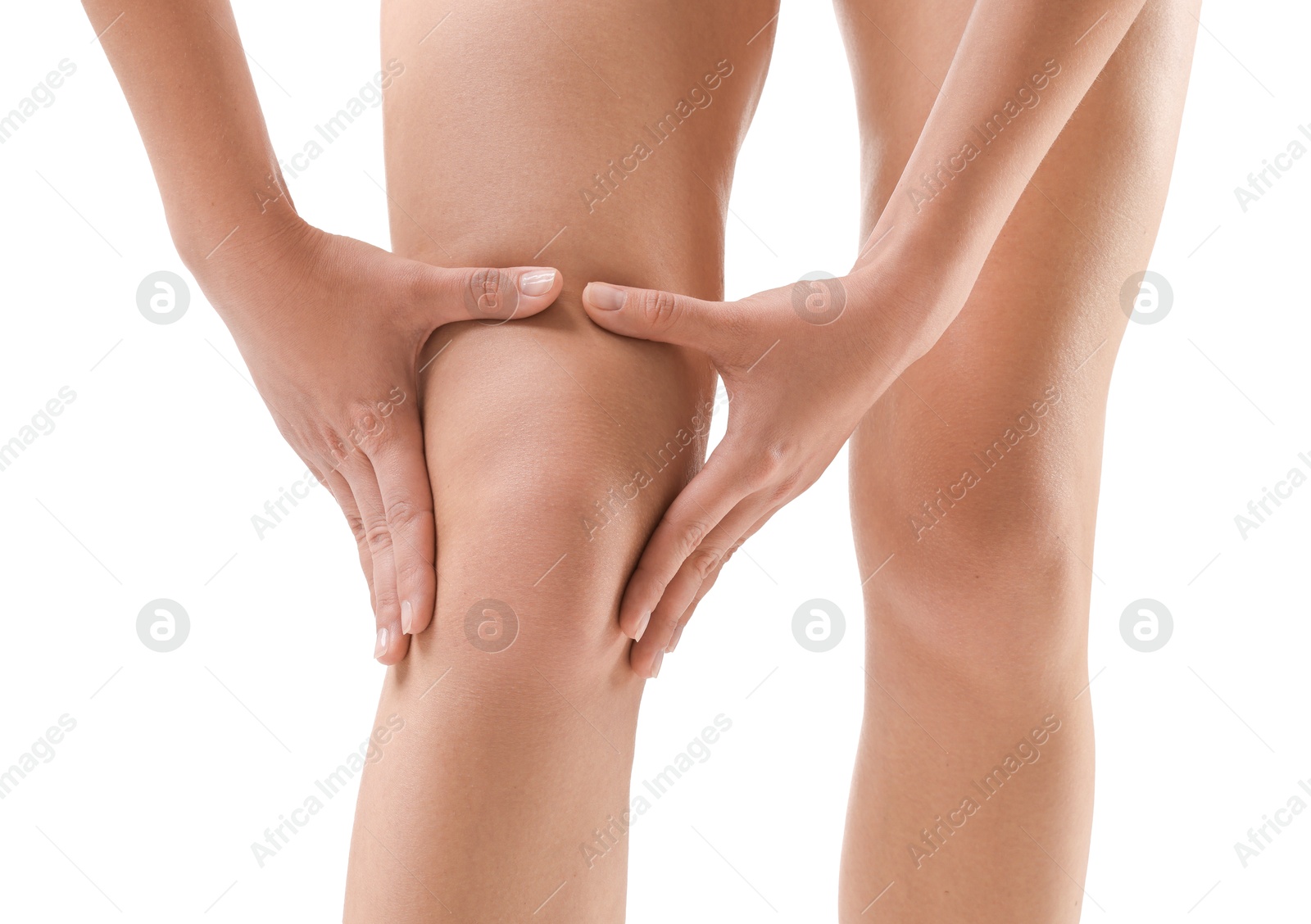 Photo of Woman showing her slim legs on white background, closeup