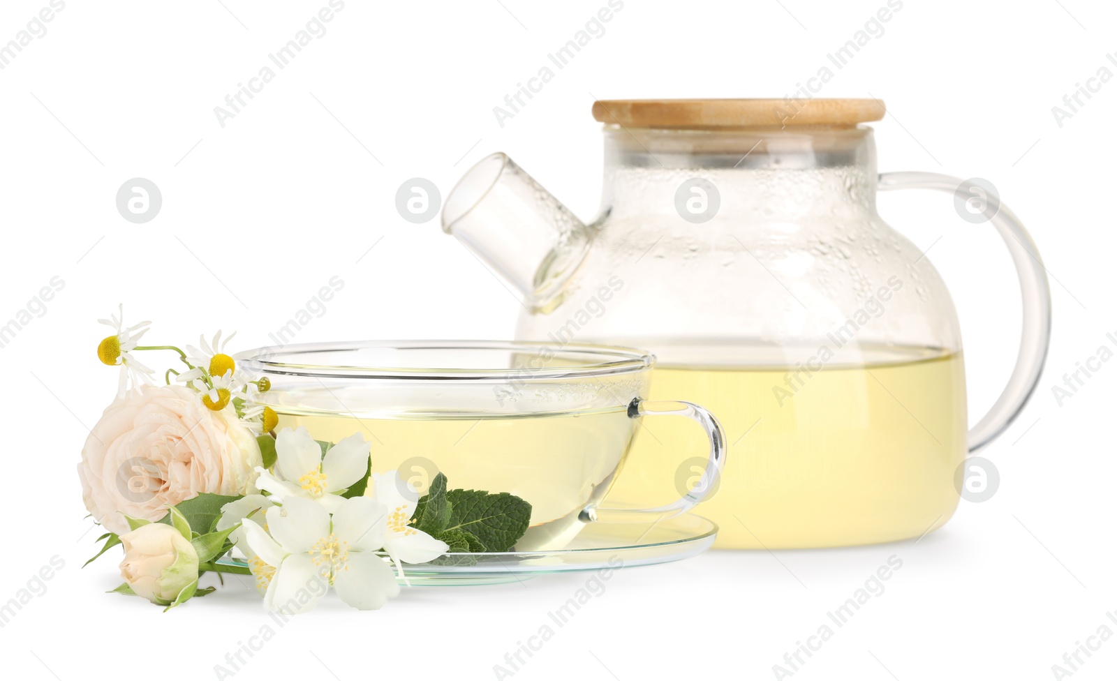 Photo of Aromatic herbal tea with different flowers and mint isolated on white