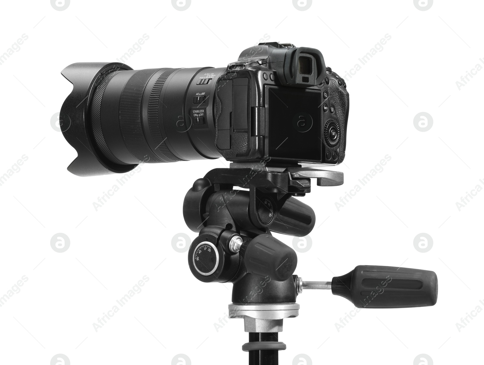 Photo of Modern camera with tripod isolated on white. Photographer's equipment