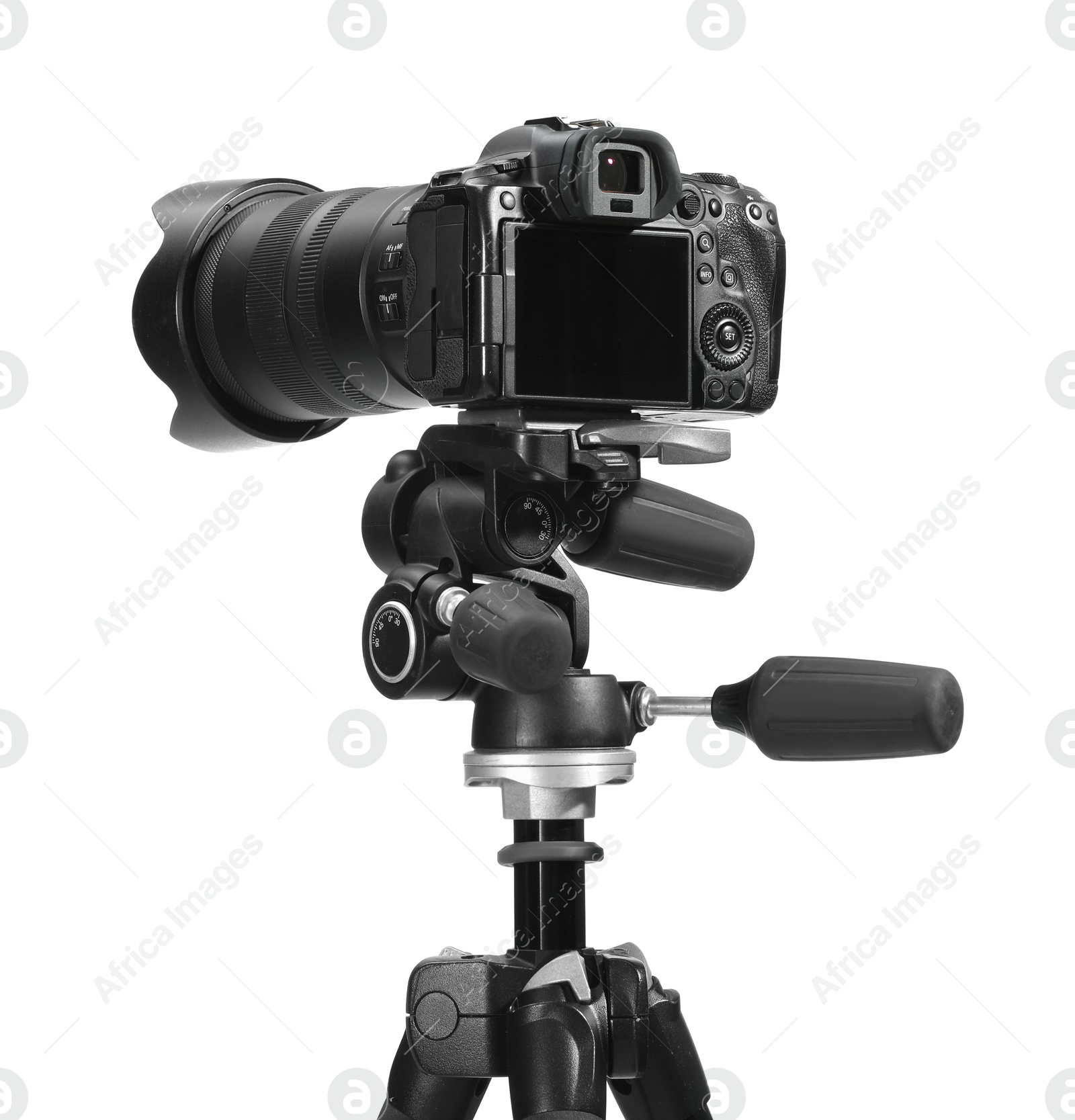 Photo of Modern camera with tripod isolated on white. Photographer's equipment