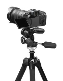 Photo of Modern camera with tripod isolated on white. Photographer's equipment