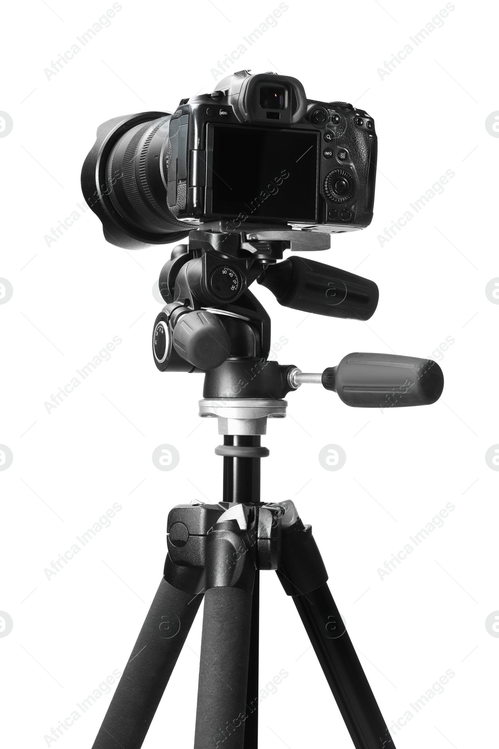 Photo of Modern camera with tripod isolated on white. Photographer's equipment