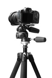 Modern camera with tripod isolated on white. Photographer's equipment