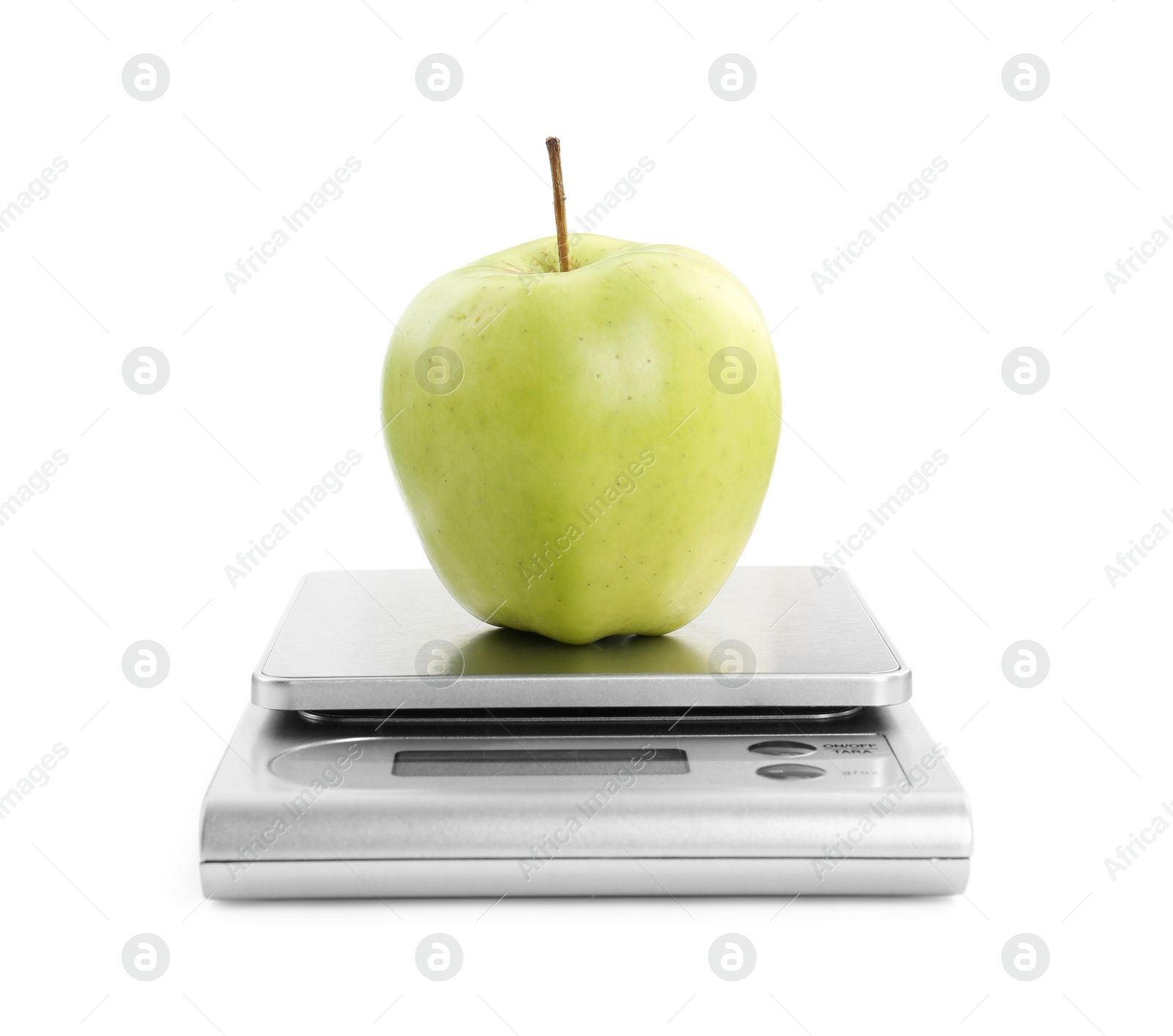 Photo of Kitchen scale with apple isolated on white