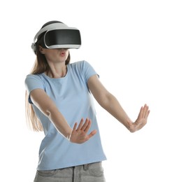 Surprised woman using virtual reality headset on white background