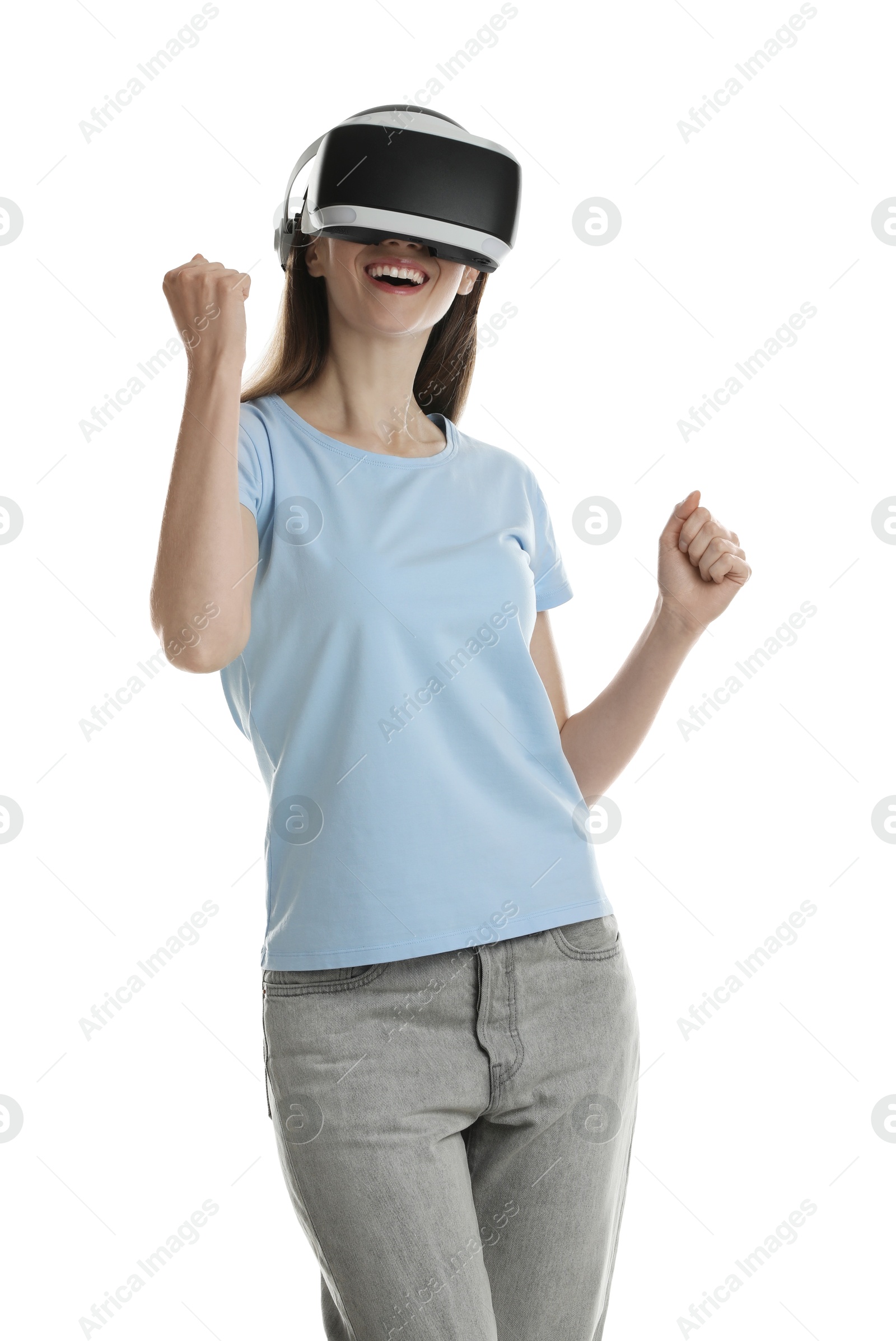 Photo of Smiling woman using virtual reality headset on white background