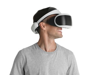 Photo of Smiling man using virtual reality headset on white background