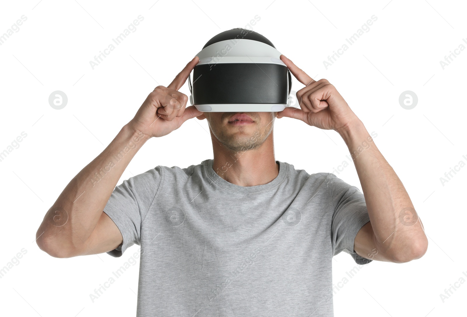 Photo of Man using virtual reality headset on white background