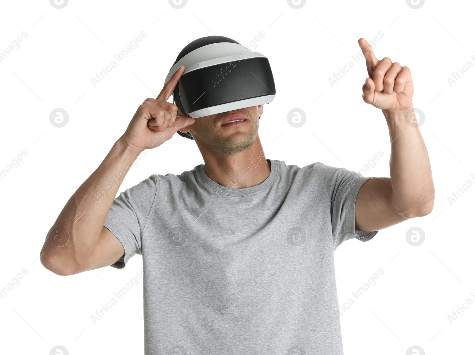 Photo of Man using virtual reality headset on white background