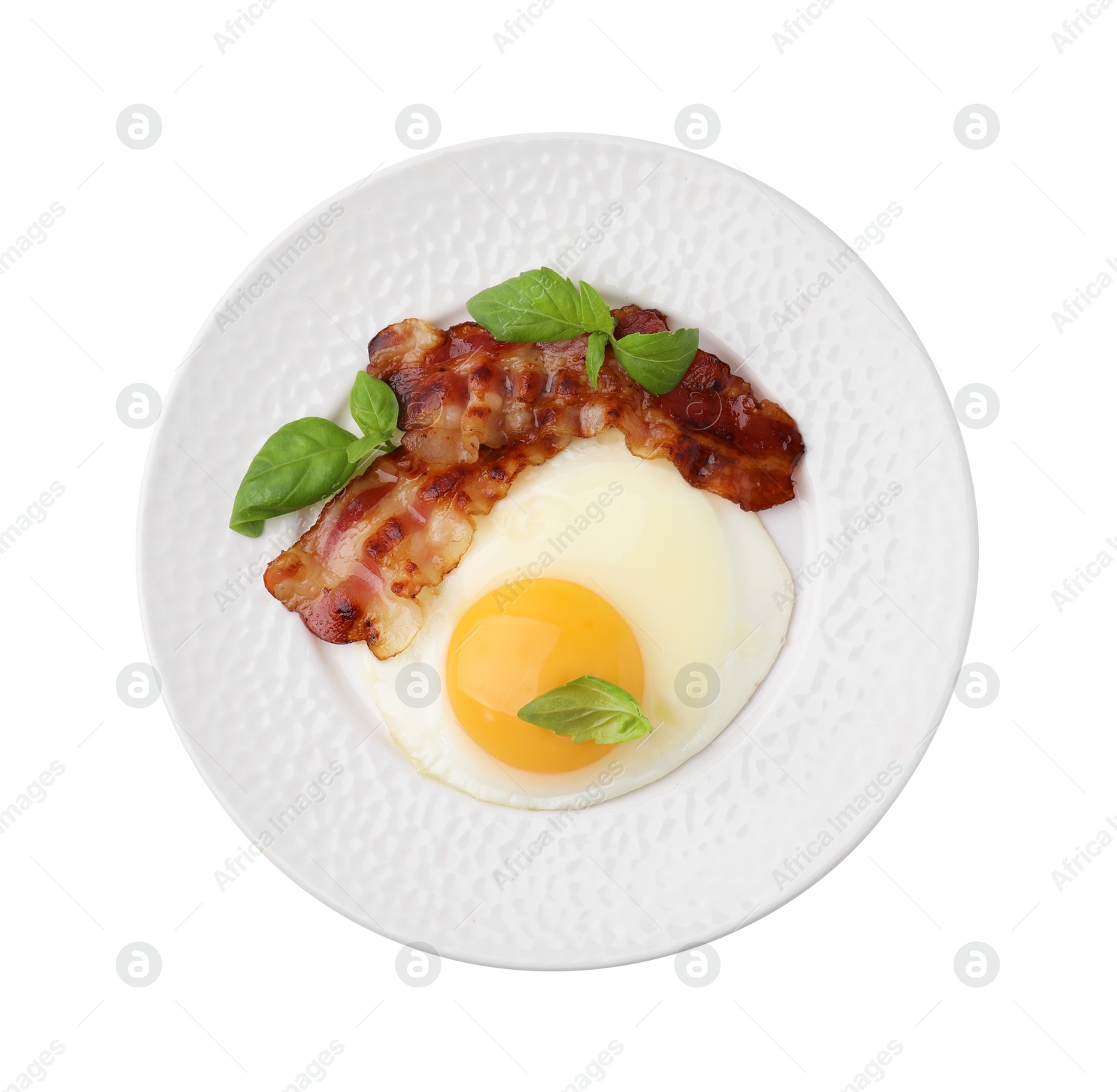 Photo of Fried egg, bacon and basil isolated on white, top view