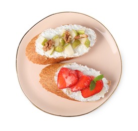 Photo of Delicious ricotta bruschettas with pear, strawberry and walnut isolated on white, top view