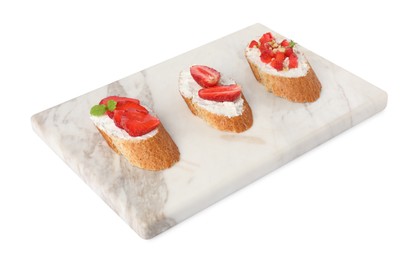 Photo of Delicious ricotta bruschettas with strawberry, mint and walnut isolated on white