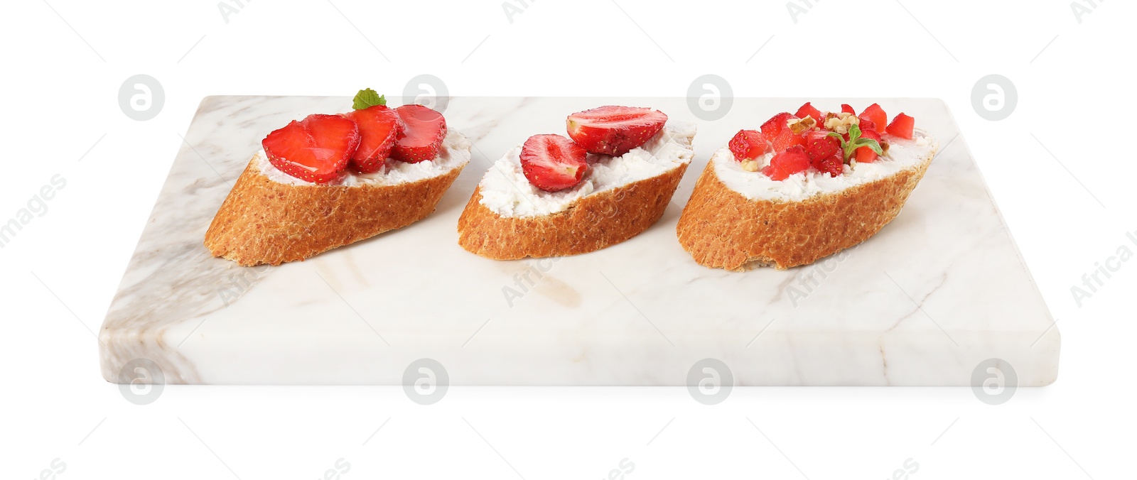 Photo of Delicious ricotta bruschettas with strawberry, mint and walnut isolated on white