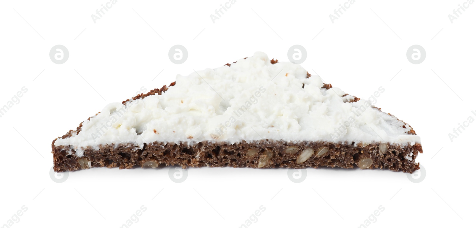 Photo of Delicious fresh ricotta (cream cheese) on piece of bread isolated on white