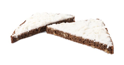 Photo of Delicious fresh ricotta (cream cheese) on pieces of bread isolated on white