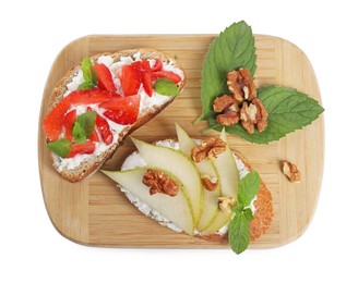 Photo of Delicious bruschettas with fresh ricotta (cream cheese), strawberry, mint and pear isolated on white, top view
