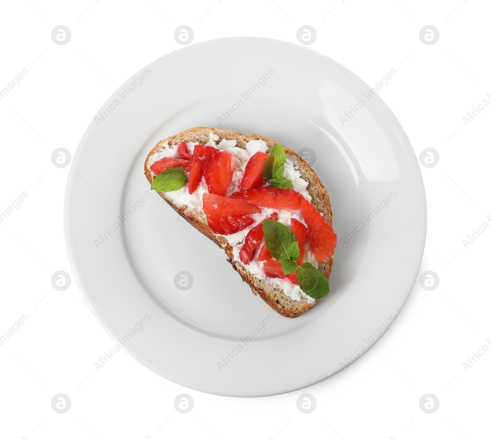 Photo of Delicious bruschetta with fresh ricotta (cream cheese), strawberry and mint isolated on white, top view