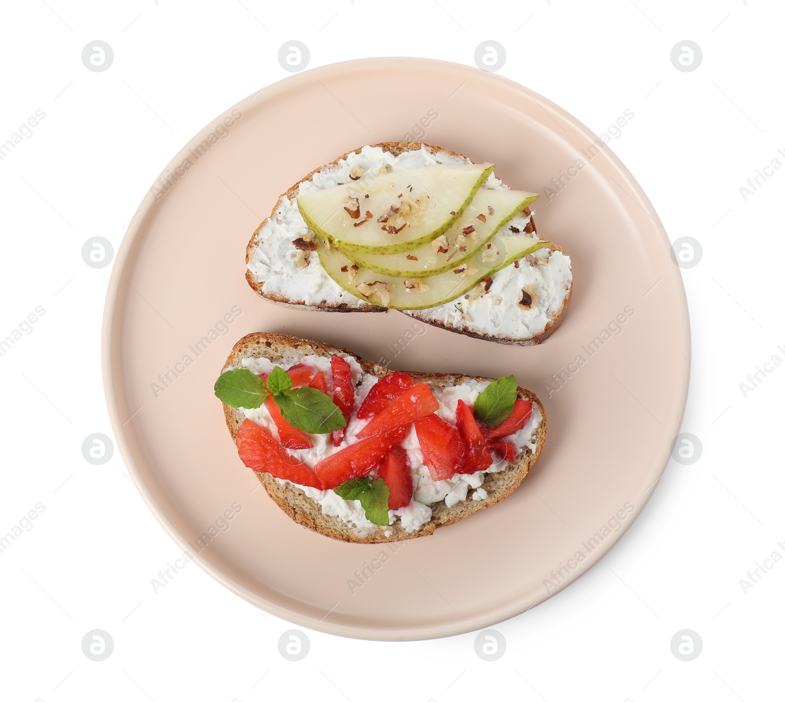 Photo of Delicious bruschettas with fresh ricotta (cream cheese), strawberry, mint and pear isolated on white, top view