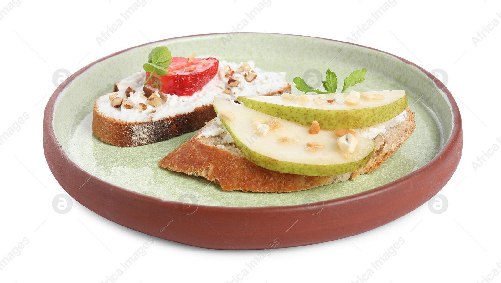 Photo of Delicious bruschettas with fresh ricotta (cream cheese), mint, strawberry and pear isolated on white