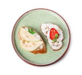 Photo of Delicious bruschettas with fresh ricotta (cream cheese), mint, strawberry and pear isolated on white, top view