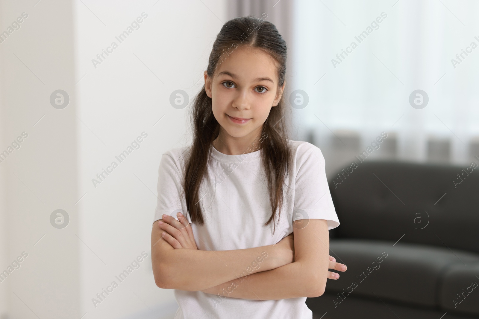 Photo of Portrait of beautiful little girl indoors. Cute child