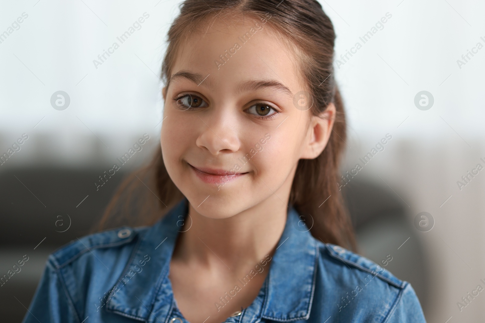 Photo of Portrait of beautiful little girl indoors. Cute child