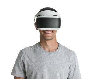 Photo of Smiling man using virtual reality headset on white background