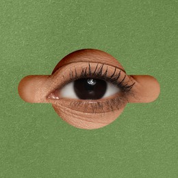 Image of Woman looking through keyhole in green surface