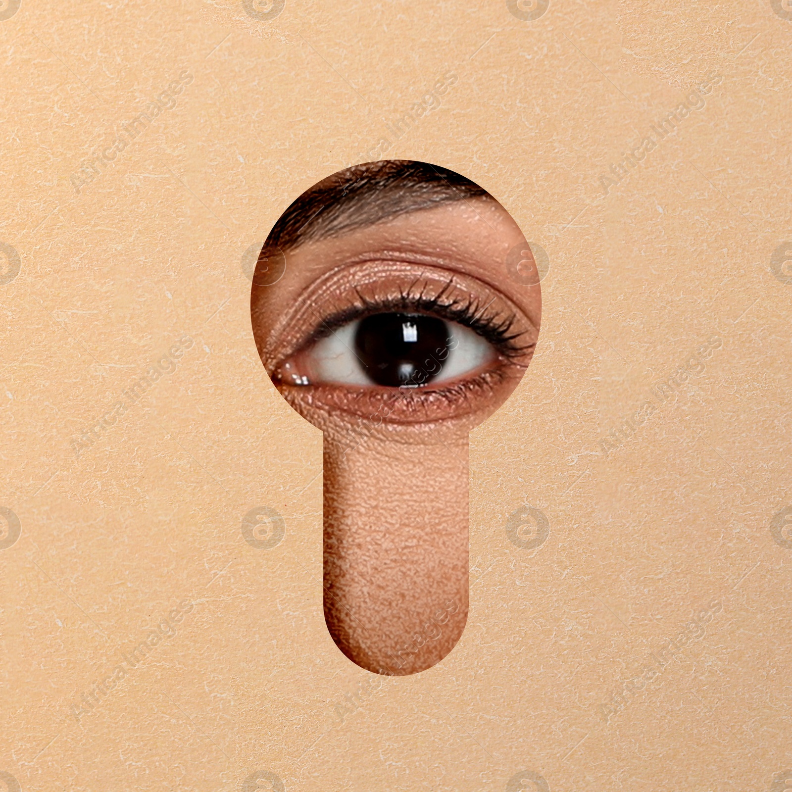 Image of Woman looking through keyhole in dark beige surface